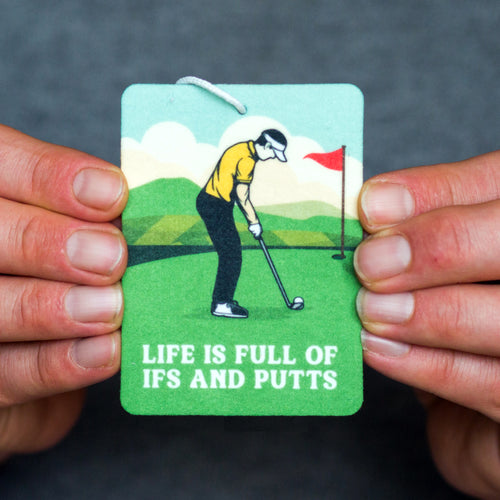 golf themed air freshener for a car with illustration of a golfer and the pun 'Life is full of ifs and putts'.