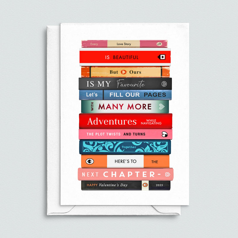 Book themed Valentine's Day card featuring a romantic message spelt out on a series of books